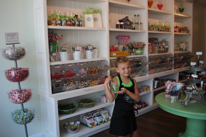 One of the charming salespeople at the candy shop